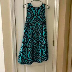 Black and torquoise swing dress.